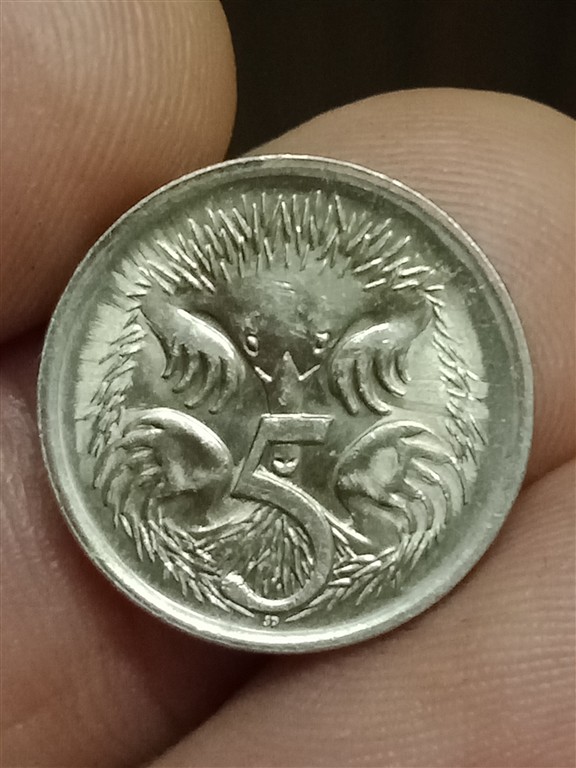 Strange-Radiating-Lines-On-1988-5-Cents